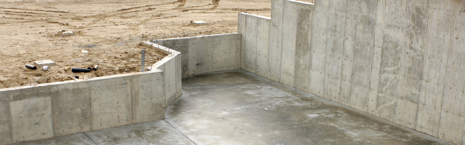 A fresh poured concrete building foundation